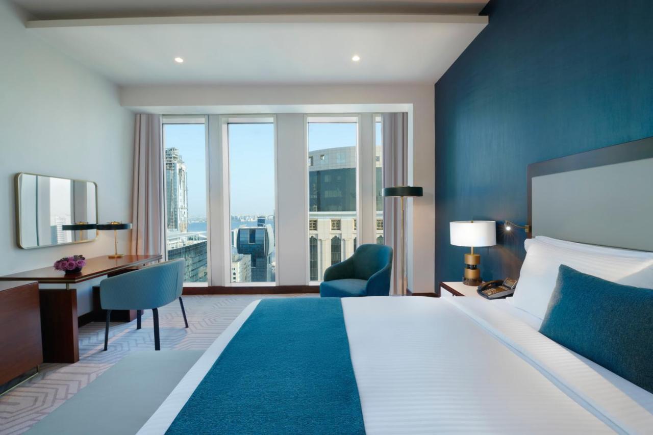 Wyndham Grand Doha West Bay Beach Exterior foto A guest room at the hotel